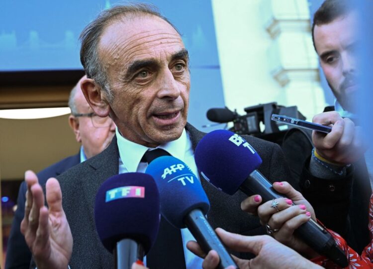 French essayist, political journalist Eric Zemmour talks to journalists after attending the panel discussion Publicity and the family during the fourth demographic summit in a cultural centre in Budapest on September 24, 2021. - The meeting is a platform for decision-makers, political players, religious and civic leaders, economic and media actors, as well as representatives of the academic world to think together, discuss the challenges ahead of us and draw up proposals for common solutions. (Photo by Attila KISBENEDEK / AFP) (Photo by ATTILA KISBENEDEK/AFP via Getty Images)
