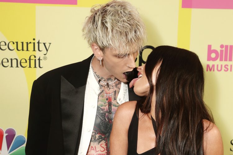 LOS ANGELES, CA - MAY 23:  2021 BILLBOARD MUSIC AWARDS -- Pictured: (l-r) Machine Gun Kelly and Megan Fox arrive to the 2021 Billboard Music Awards held at the Microsoft Theater on May 23, 2021 in Los Angeles, California. --  (Photo by Todd Williamson/NBC/NBCU Photo Bank via Getty Images)