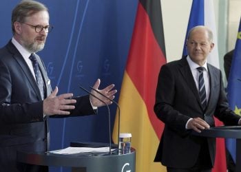 German Chancellor Olaf Scholz, right, and the Prime Minister of the Czech Republic, Petr Fiala, left, address the media during a press conference as part of a meeting at the chancellery in Berlin, Germany, Thursday, May 5, 2022. (AP Photo/Michael Sohn)