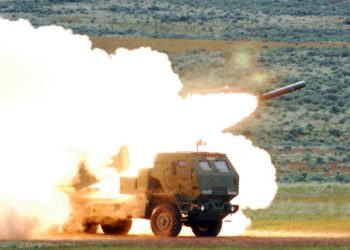 A rocket leaves the High Mobility Artillery Rocket System as part of the certification of Bravo Battery, 17th Fires Brigade at Yakima Training Center. The battery's training involved firing rockets at command, firing at will, and firing to hit a moving target.