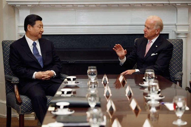 WASHINGTON, DC - FEBRUARY 14:  (AFP OUT) U.S. Vice President Joe Biden (R) and Chinese Vice President Xi Jinping talk during an expanded bilateral meeting with other U.S. and Chinese officials in the Roosevelt Room at the White House February 14, 2012 in Washington, DC. While in Washington, Vice President Xi will meet with Biden, President Barack Obama and other senior Administration officials to discuss a broad range of bilateral, regional, and global issues.  (Photo by Chip Somodevilla/Getty Images)