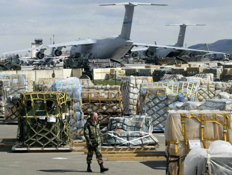 Cargo supplies are piled on the tarmac at the Ramstein U.S. air base in central Germany in this April 7, 2003 file photo.  Three members of an Islamic terror group suspected of planning attacks at Frankfurt airport and a U.S. military base in Ramstein have been arrested in Frankfurt late on September 4, 2007, Germany's federal prosecutors confirmed on Wednesday . Picture taken on April 7, 2003. REUTERS/Michael Dalder