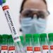 FILE PHOTO: Test tubes labelled "Monkeypox virus positive" are seen in this illustration taken May 23, 2022. REUTERS/Dado Ruvic/Illustration