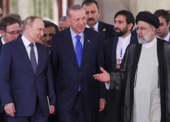 Russian President Vladimir Putin, Iranian President Ebrahim Raisi and Turkish President Tayyip Erdogan arrive at a news conference in Tehran, Iran July 19, 2022. Turkish Presidential Press Office/Handout via REUTERS ATTENTION EDITORS - THIS PICTURE WAS PROVIDED BY A THIRD PARTY. NO RESALES. NO ARCHIVES