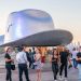 A giant cowboy hat is on display outside the Tesla Giga Texas manufacturing facility during the "Cyber Rodeo" grand opening party on April 7, 2022 in Austin, Texas. - Tesla welcomed throngs of  electric car lovers to Texas on April 7 for a huge party inaugurating a "gigafactory" the size of 100 professional soccer fields. (Photo by SUZANNE CORDEIRO / AFP) (Photo by SUZANNE CORDEIRO/AFP via Getty Images)