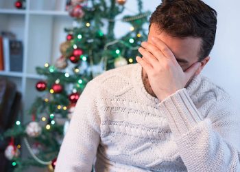 Man felling depressed and lonely during the christmas time