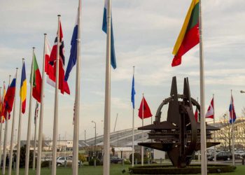 NATO country flags wave at the entrance of NATO headquarters in Brussels as Secretary of Defense Ash Carter attends a NATO ministerial Feb. 11, 2016. (Photo by Senior Master Sgt. Adrian Cadiz)(Released)