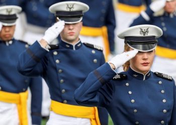 COLORADO SPRINGS, CO - MAY 26: Members of the United States Air Force Academy Class of 2021 salute during their graduation ceremony at Falcon Stadium on May 26, 2021 in Colorado Springs, Colorado. Chairman of the Joint Chiefs of Staff General Mark A. Milley gave the commencement address to the 1019 graduates from the academy. (Photo by Michael Ciaglo/Getty Images)