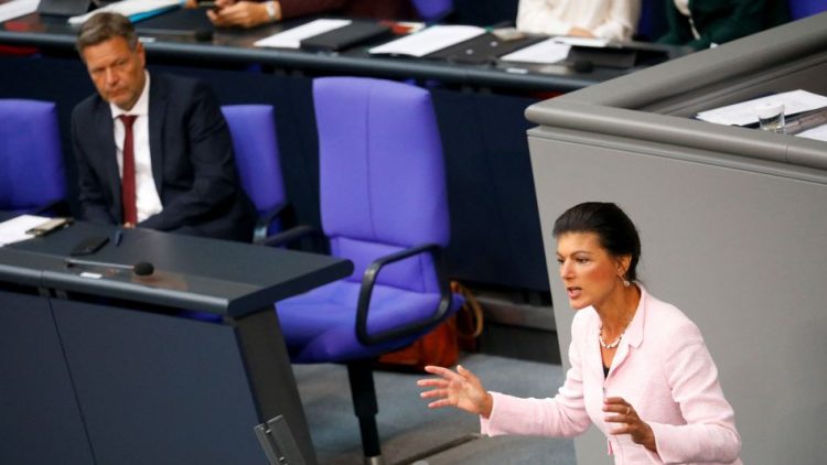 Sahra Wagenknecht of the left "Die Linke" party speaks as German Economy Minister Robert Habeck listens during the budget debate in the plenary hall of the German lower house of parliament or Bundestag, in Berlin, Germany September 8, 2022.  REUTERS/Michele Tantussi