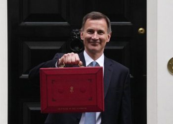 LONDON, ENGLAND - MARCH 15: UK Chancellor Jeremy Hunt leaves Downing Street with the despatch box to present his spring budget to parliament on March 15, 2023 in London, England. Highlights of the 2023 budget are an increase in the tax-free allowance for pensions which the Chancellor hopes will stem the number of people taking retirement, a package of help for swimming pools affected by the increase in energy bills and changes to childcare support for parents on universal credit. (Photo by Carl Court/Getty Images)