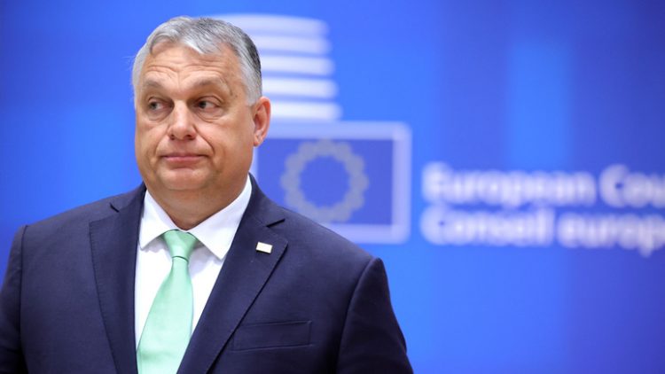 Hungary's Prime Minister Viktor Orban waits for the start of a round table meeting at an EU summit in Brussels, Thursday, March 23, 2023. European Union leaders meet Thursday for a two-day summit to discuss the latest developments in Ukraine, the economy, energy and other topics including migration. (AP Photo/Olivier Matthys)