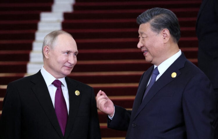 Russian President Vladimir Putin is welcomed by Chinese President Xi Jinping during a ceremony at the Belt and Road Forum in Beijing, China, October 17, 2023. Sputnik/Sergei Savostyanov/Pool via REUTERS ATTENTION EDITORS - THIS IMAGE WAS PROVIDED BY A THIRD PARTY.