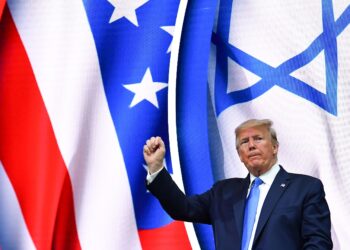 US President Donald Trump stands on stage after his address to the Israeli American Council National Summit 2019 at the Diplomat Beach Resort in Hollywood, Florida on December 7, 2019. (Photo by MANDEL NGAN / AFP) / ALTERNATE CROP (Photo by MANDEL NGAN/AFP via Getty Images)