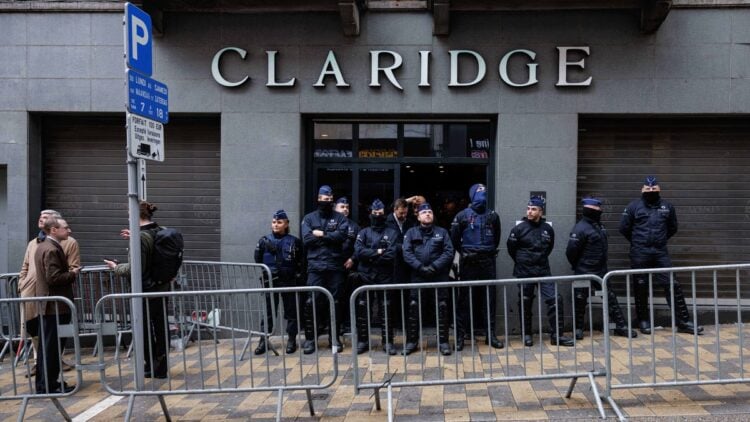 Belgian Police block the entrance of the Claridge hotel in Brussesl where is held the "NatCon" national conservatism conference gathering hard-right politicians on April 16, 2024 as Brussels authorities ordered its shutdown, after it was targeted by online protesters and bumped from its first two choices of venue. (Photo by Simon Wohlfahrt / AFP) (Photo by SIMON WOHLFAHRT/AFP via Getty Images)
